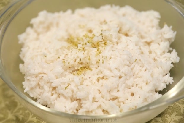 Time to serve the hot coconut lime rice with some chicken or shrimp on top!