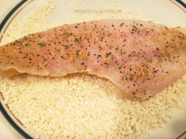 The rockfish fillets are dredged in panko crumbs to coat both sides before cooking.