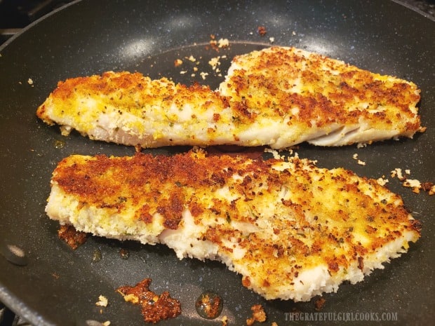 Panko custed fish is flipped and other side is cooked, as well.