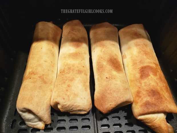 The chimichangas are crispy and browned when done cooking.