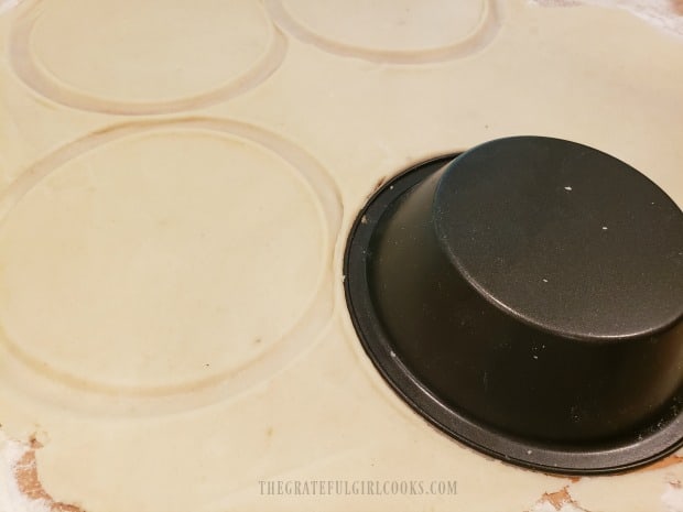 The pie dough is cut into 6 circles for the blackberry handpies.