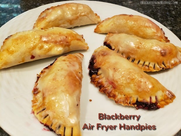 Make six delicious, glazed blackberry air fryer handpies in about 20 minutes total! They're easy to make, with purchased or homemade pie crust dough!