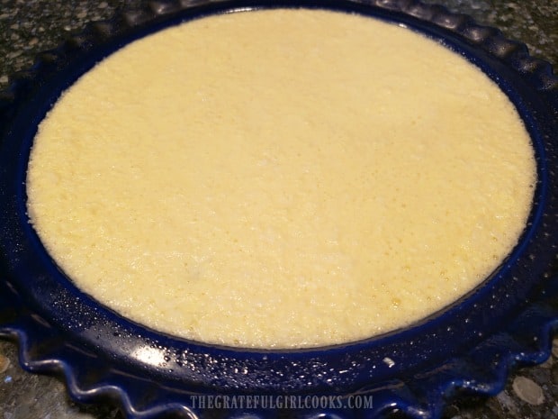 Coconut pie in pie pan is ready for the oven.