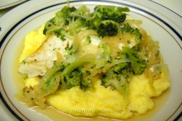 Here the creamy parmesan polenta is served with chicken and broccoli on top.
