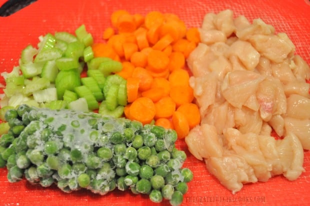 Chicken, celery, frozen peas and sliced carrots are part of the filling for this dish.