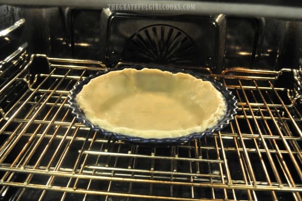 Pre-baking the bottom pie crust for a few minutes.