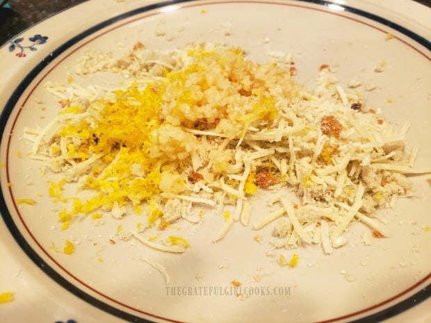 Bread crumbs, lemon zest, garlic, and Parmesan cheese are combined to make topping for fish.