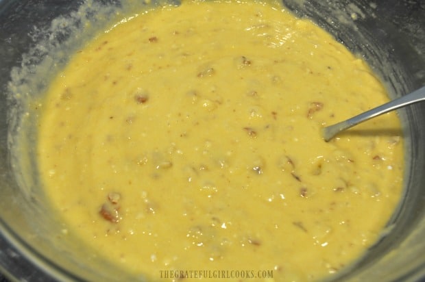 Batter for the pound cake is ready to pour into a tube pan for baking.