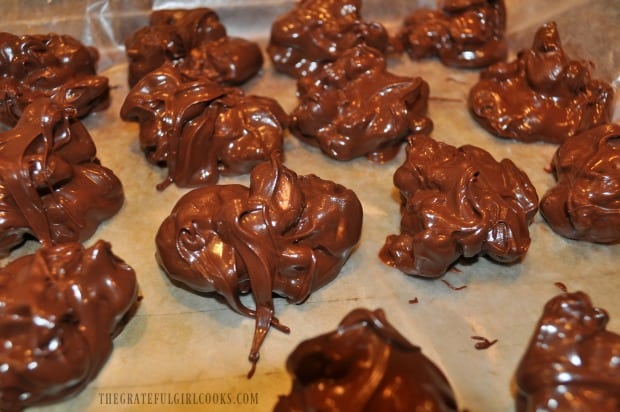 The chocolate looks shiny while it is still slightly melted, so let the candies rest to firm up.