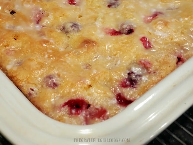 An up close photo of the glazed cranberry orange cake.