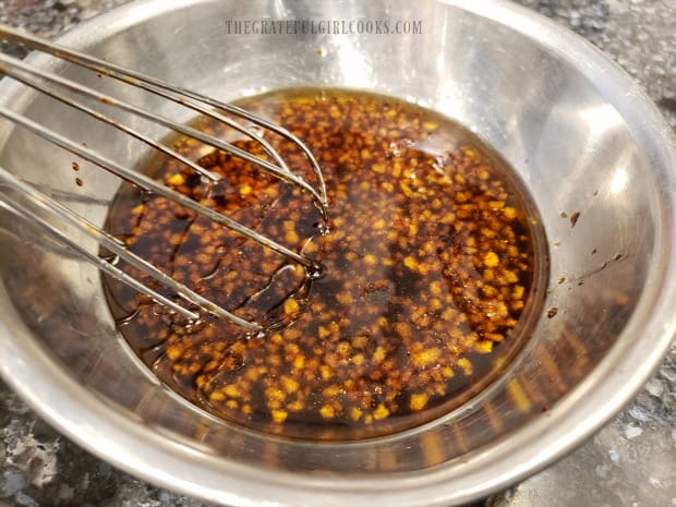 A sweet soy and garlic sauce is whisked together for marinating chicken thighs.