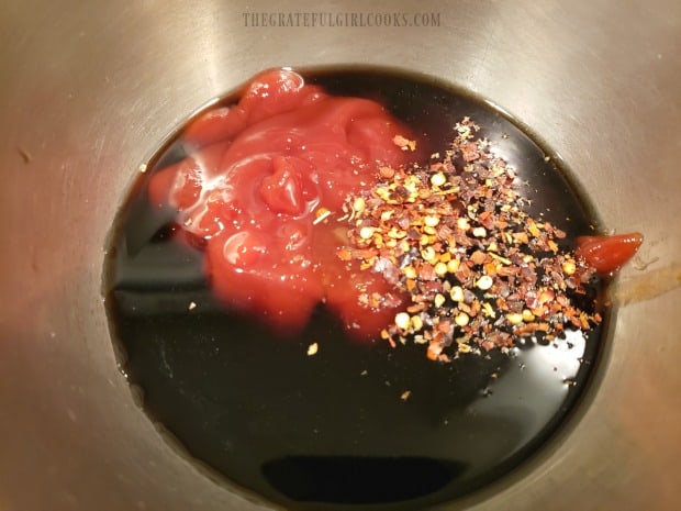 Ingredients for the Asian-inspired sauce are measured into bowl for mixing.