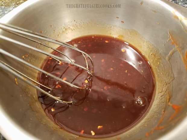 Sauce ingredients are whisked together until fully blended.