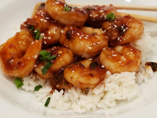 A close-up of the simple Szechuan shrimp, on top of white, steamed rice.