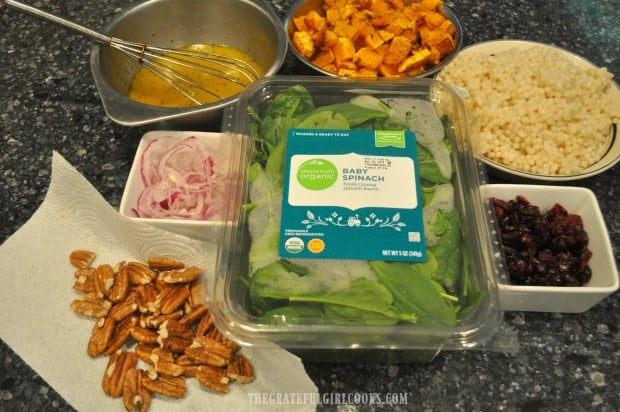 All the ingredients for the salad are prepped and ready to.