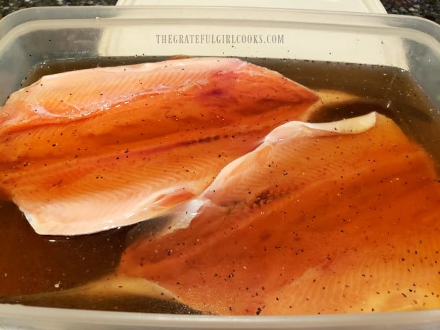 The butterflied trout are soaked in brine for one hour before smoking on the grill.