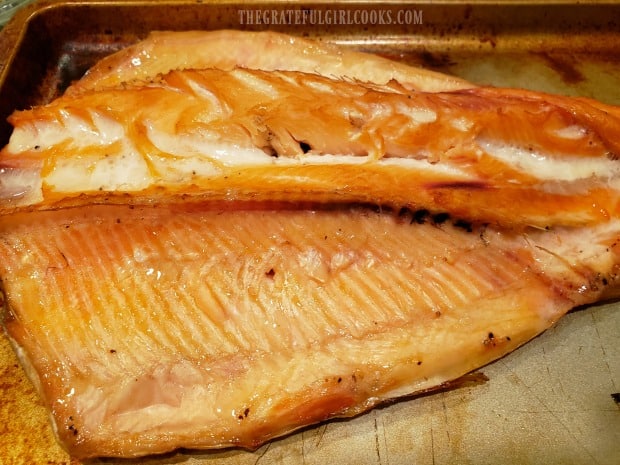 Here is one Traeger grill smoked trout, fully cooked, and ready to de-bone and eat!