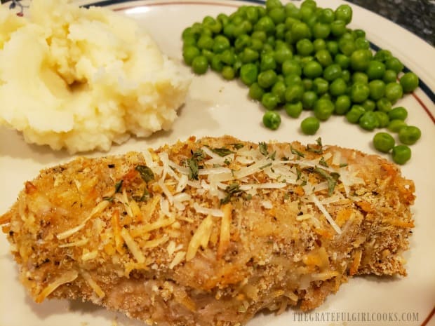 One of the easy baked pork chops, served with mashed potatoes and peas.