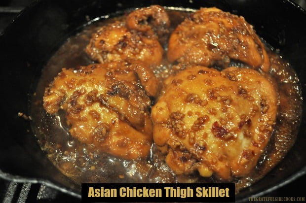 Asian Chicken Thigh Skillet is a delicious, EASY dish to make. Chicken thighs are pan-seared, then covered and cooked in a simple Asian garlic sauce!