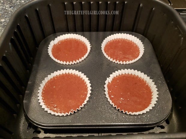 Four chocolate espresso muffins are cooked at a time in the air fryer.