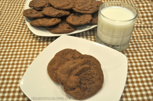 A glass of cold milk is served with the mocha chocolate chip cookies.