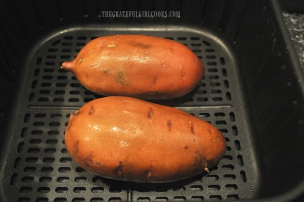 Each sweet potato is rubbed or spritzed with oil lightly, before cooking.