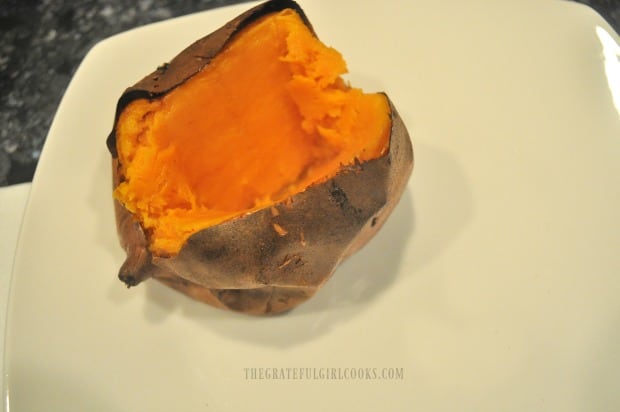 Cut the sweet potato open, and fluff the insides with a fork.