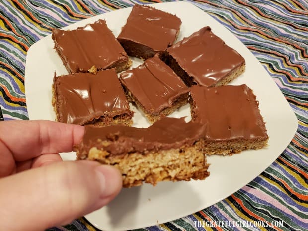 Grabbing a bite of one of the butterfinger bars to munch on!