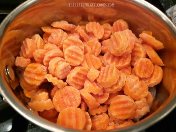 Frozen carrots are cooked before adding them to a marmalade glaze.