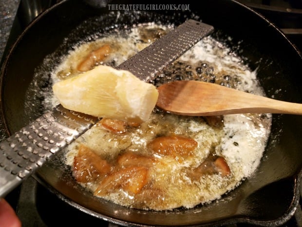 Fresh ginger is finely grated and added to marmalade and butter in skillet.