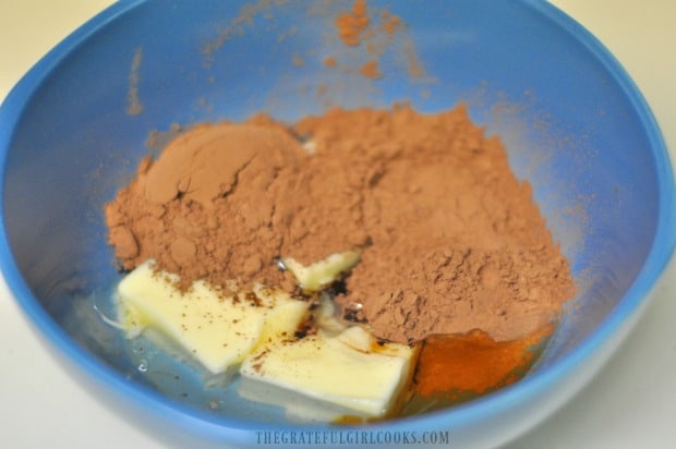 Ingredients are mixed together in a small bowl for the brownie frosting.