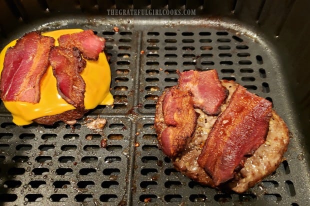 Cheese has melted and bacon is hot. Time to build a burger.