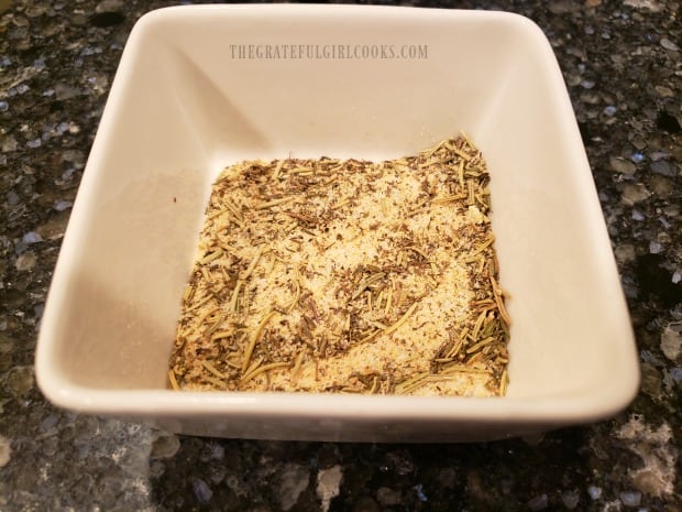 A dry spice mix is made to season chicken thighs.