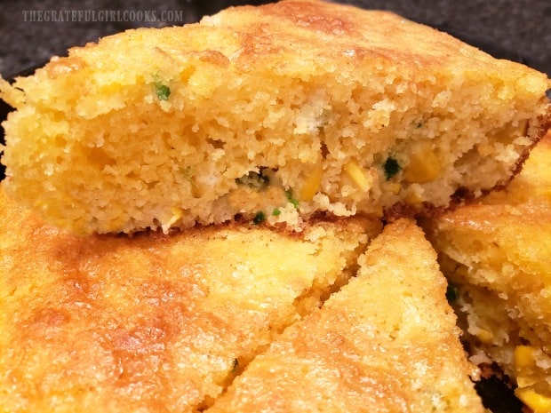 A slice of the finished jalapeño cheddar cornbread is ready to eat!