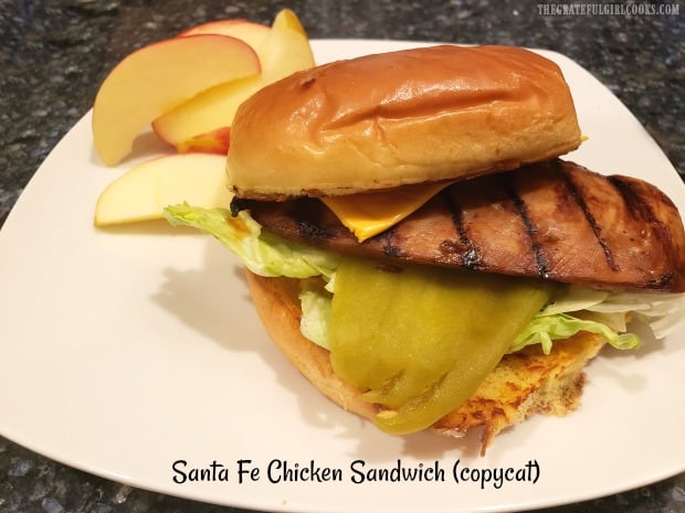 Enjoy a tasty copycat Carl's Jr. Santa Fe Chicken Sandwich. Marinated chicken, cheese, Southwest sauce, green chile & lettuce on a toasted bun. YUM!