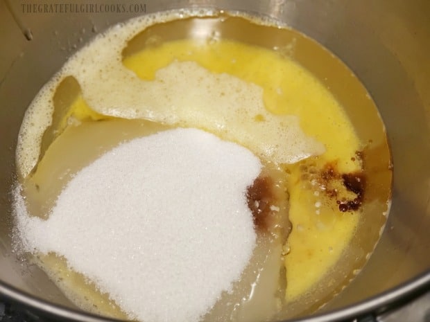 Eggs, sugar, oil, and vanilla are mixed together in large bowl.