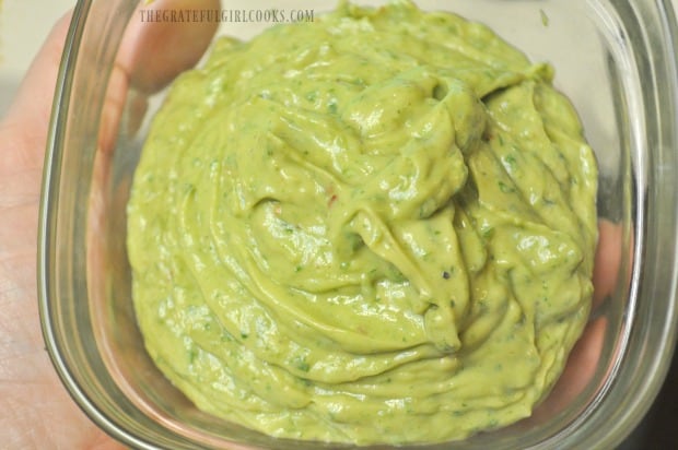 Avocado Cilantro Lime Dressing is mixed until creamy and smooth, using a blender.