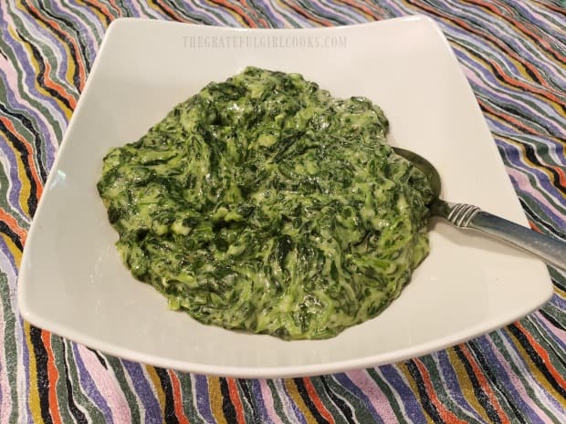 A bowl of easy creamy spinach, ready to serve.
