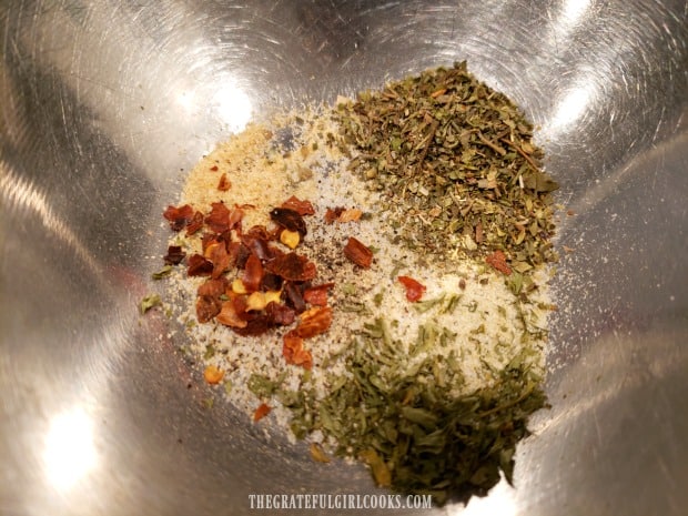 Spices are mixed together before adding to the pasta.
