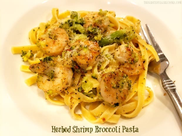 Herbed Shrimp Broccoli Pasta is a delicious, Italian-inspired meal of pan-seared shrimp, broccoli, and pasta noodles w/ Parmesan, olive oil & spices.