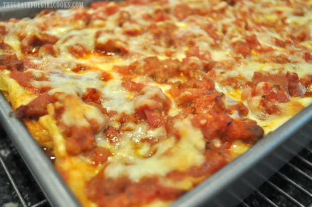A close up of the lasagna cooling for a couple minutes before slicing.