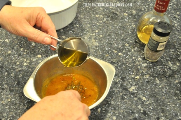 Olive oil is whisked into the pumpkin vinaigrette before serving.
