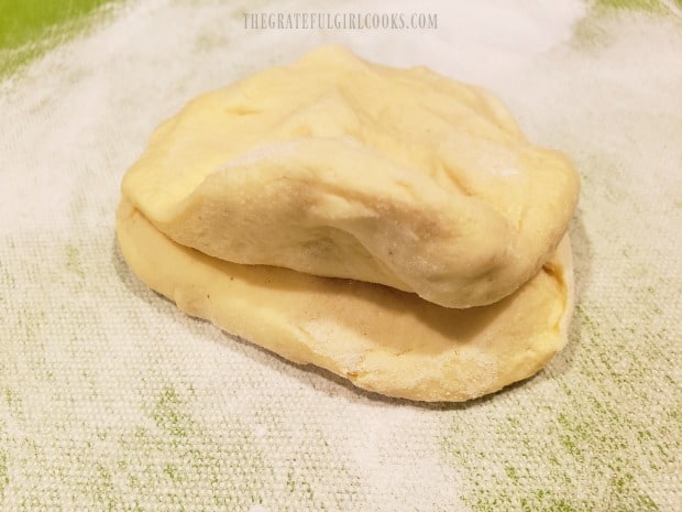 Two canned, refrigerated biscuits are used for the pizza crust dough.