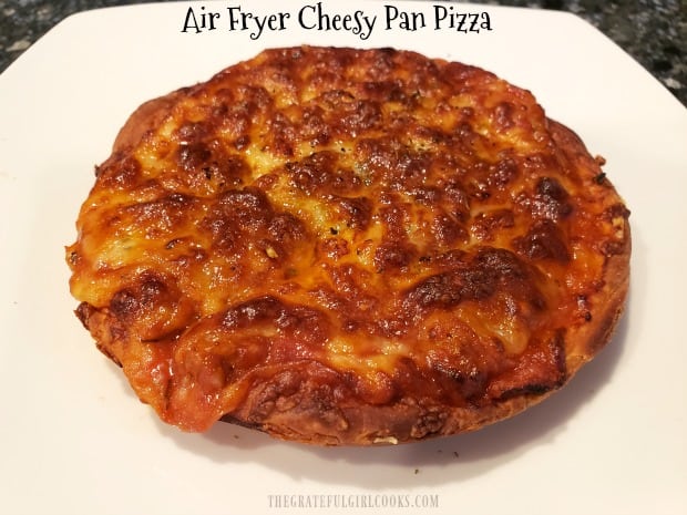 Make a delicious Air Fryer Cheesy Pan Pizza for lunch/dinner. Use canned biscuit dough for crust & Mozzarella/Parmesan cheeses, pizza sauce & spices!