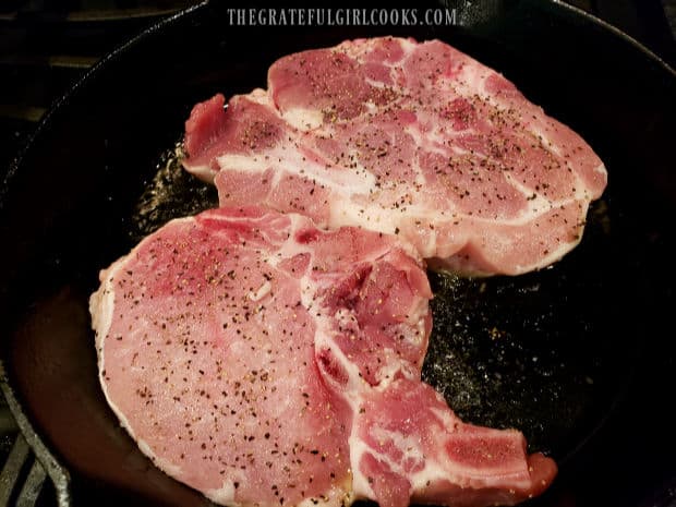The meat is seasoned and then pan-seared in olive oil in a hot skillet.