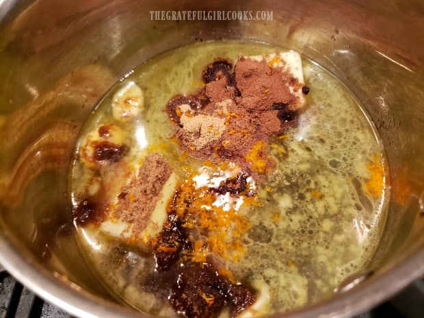Butter, maple syrup, water, brown sugar, orange zest and spices are cooked for sauce.