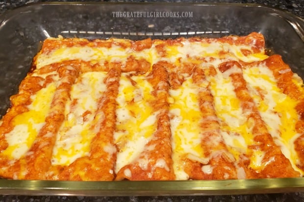 Enchiladas are baked for 20 minutes until cheese melts and they're heated through.