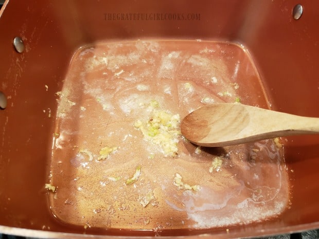 Butter and garlic is cooked in the soup pan for about a minute.