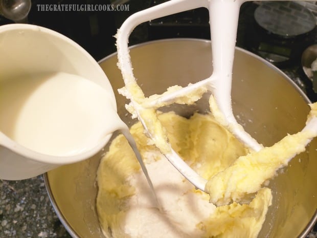 Milk is added to muffin batter in batches (alternating with dry ingredients).