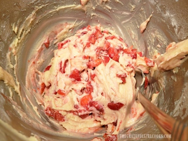 The fresh strawberries are GENTLY mixed into the muffin batter.